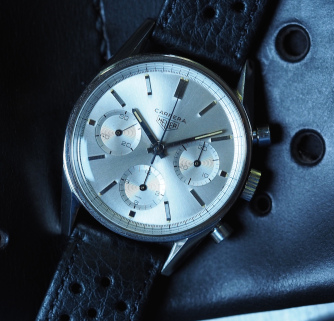 The Heuer Carrera 2447S on its watch roll